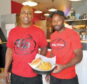 Hardy & Person Catering: Jonathan Hardy and Kari Person are the operators of a new restaurant at 787 Adams Street that specializes in gourmet hot dogs and soul food. Photo by Bill Forry